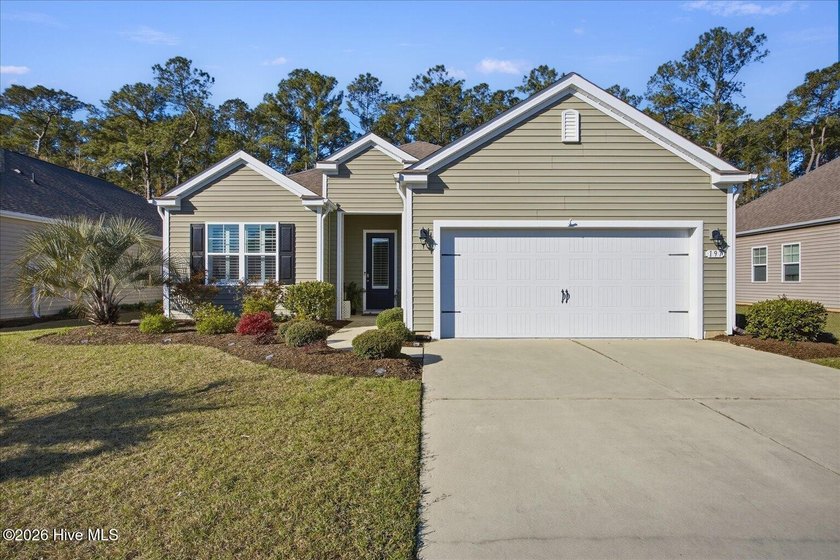 Built in 2019 and set on a quiet street in Calabash Lakes, this - Beach Home for sale in Carolina Shores, North Carolina on Beachhouse.com