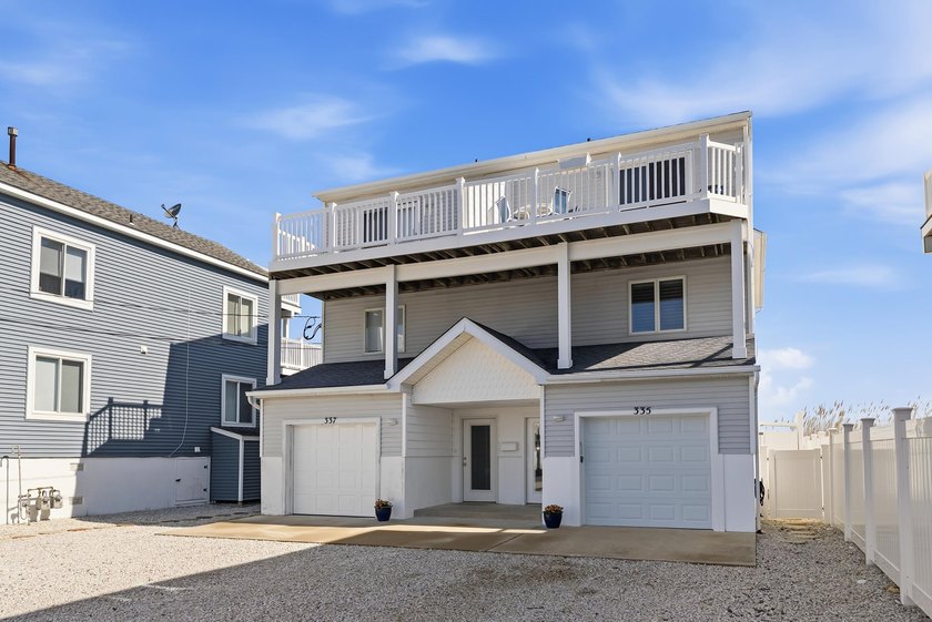 Experience coastal luxury with unobstructed bayfront views and - Beach Townhome/Townhouse for sale in Sea Isle City, New Jersey on Beachhouse.com