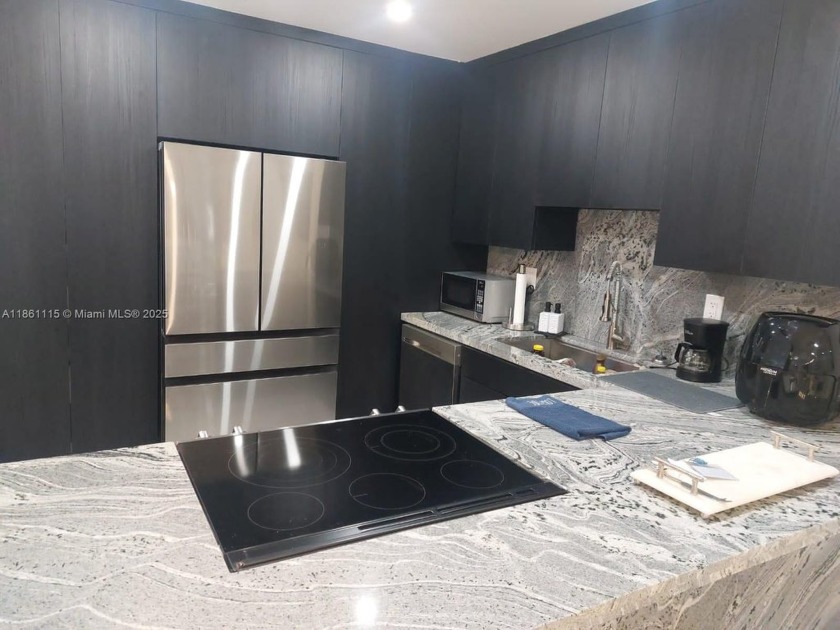 Beautifully remodeled condo located right on the beach with - Beach Condo for sale in Hallandale Beach, Florida on Beachhouse.com