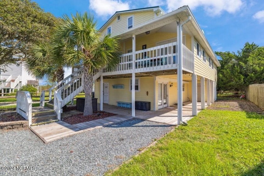 Welcome to this charming coastal cottage, nestled among majestic - Beach Home for sale in North Topsail Beach, North Carolina on Beachhouse.com