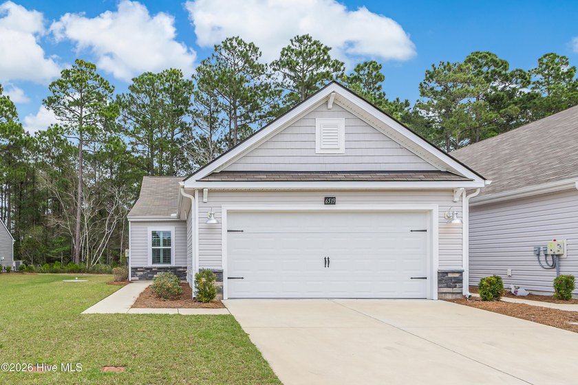 Welcome to your dream coastal retreat in the desirable Cameron - Beach Townhome/Townhouse for sale in Ocean Isle Beach, North Carolina on Beachhouse.com