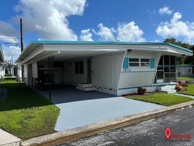 Check out this 2 bedroom, 1.5 bathroom mobile home in the - Beach Home for sale in Clearwater, Florida on Beachhouse.com