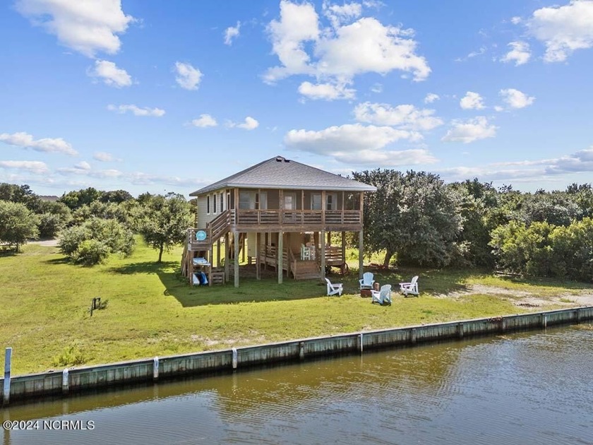 Escape to this picturesque canal-front retreat in Carova Beach - Beach Home for sale in Corolla, North Carolina on Beachhouse.com