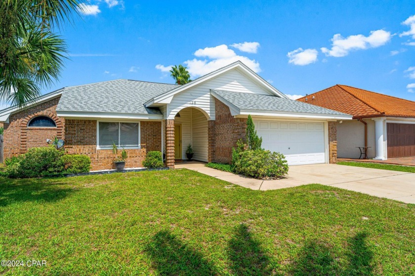 Discover coastal living at its finest in this charming beach - Beach Home for sale in Panama City Beach, Florida on Beachhouse.com