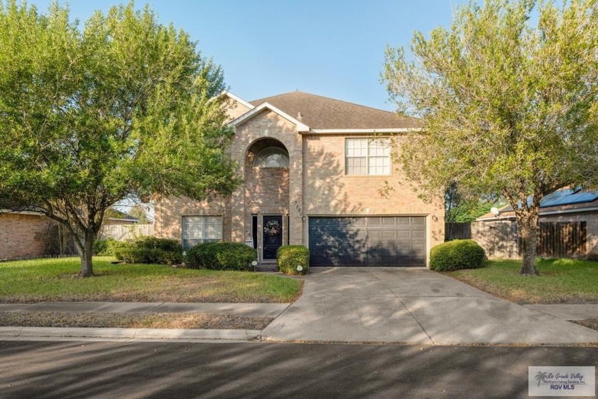 Beautiful two-story waterfront home featuring three bedrooms and - Beach Home for sale in Brownsville, Texas on Beachhouse.com