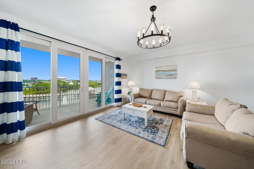 Welcome to your coastal chic retreat! This turnkey, rental-ready - Beach Condo for sale in Panama City, Florida on Beachhouse.com