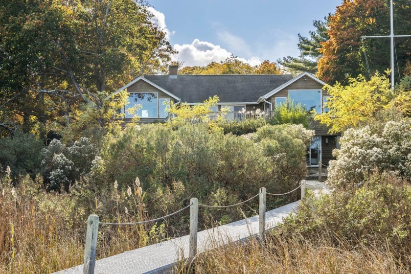 This waterfront property strikes the perfect balance of modern - Beach Home for sale in Southampton, New York on Beachhouse.com