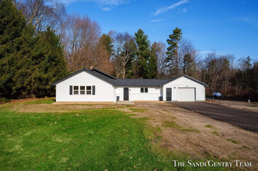 This immaculate home offers a bright and welcoming atmosphere - Beach Home for sale in New Era, Michigan on Beachhouse.com