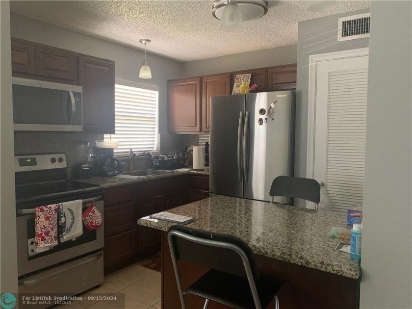 GORGEOUS UNIT ON THE BOTTOM FLOOR, CORNER.  EVERYTHING IS - Beach Condo for sale in Fort Lauderdale, Florida on Beachhouse.com