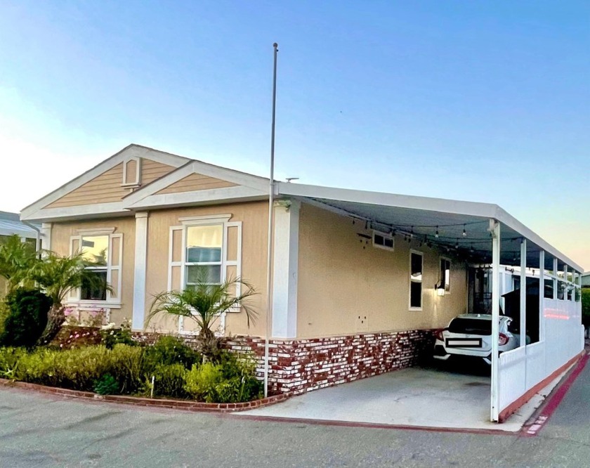 Corner Lot with Fenced Carport Parking!     One of the lowest - Beach Home for sale in Huntington Beach, California on Beachhouse.com