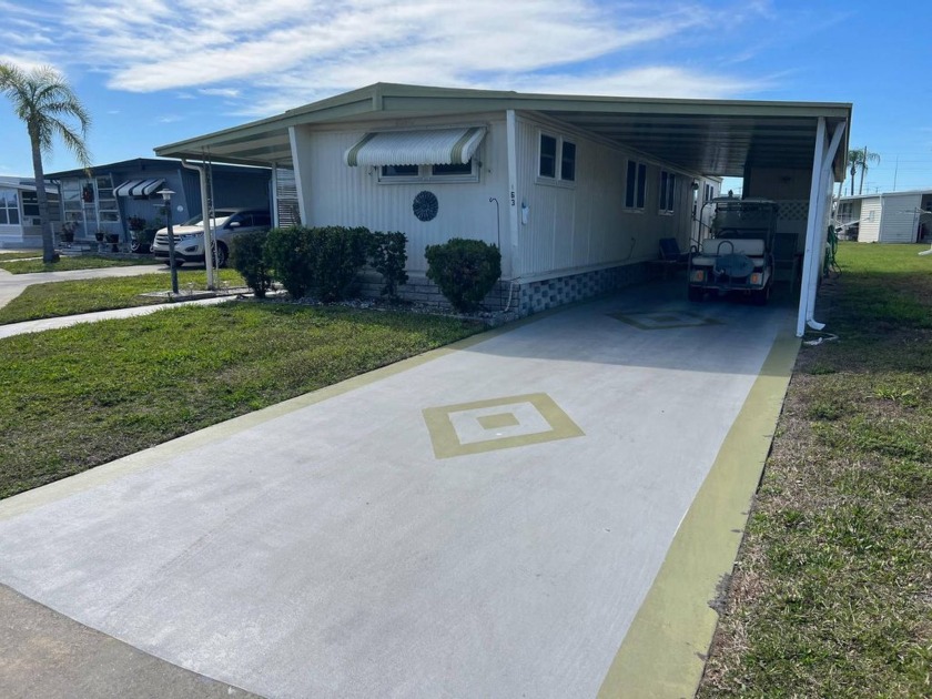 Nestled within the serene environment of Four Seasons Estates, a - Beach Home for sale in Largo, Florida on Beachhouse.com