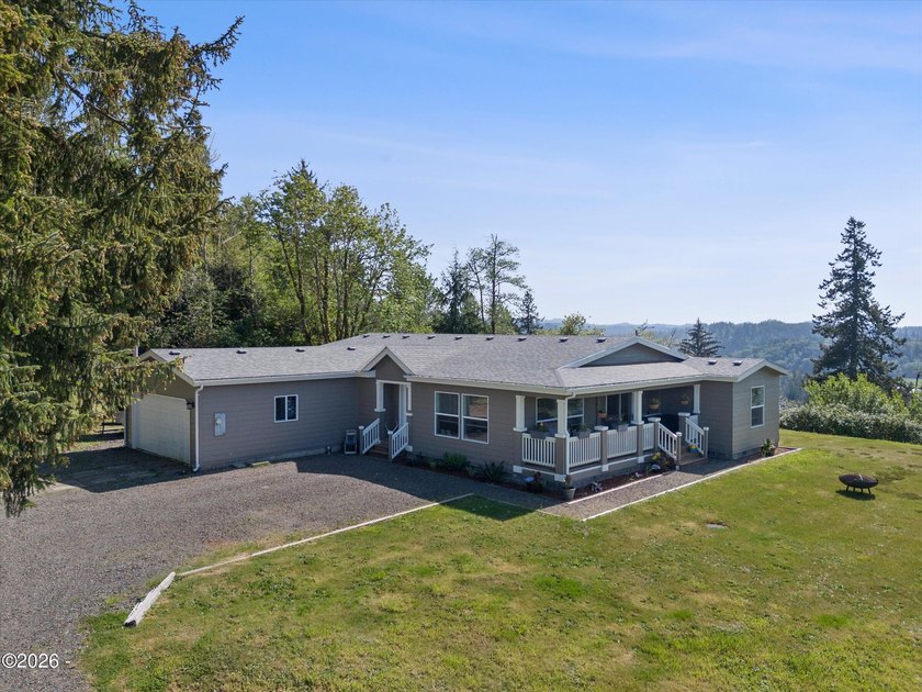 Experience peaceful living with stunning views of the Yaquina - Beach Home for sale in Toledo, Oregon on Beachhouse.com