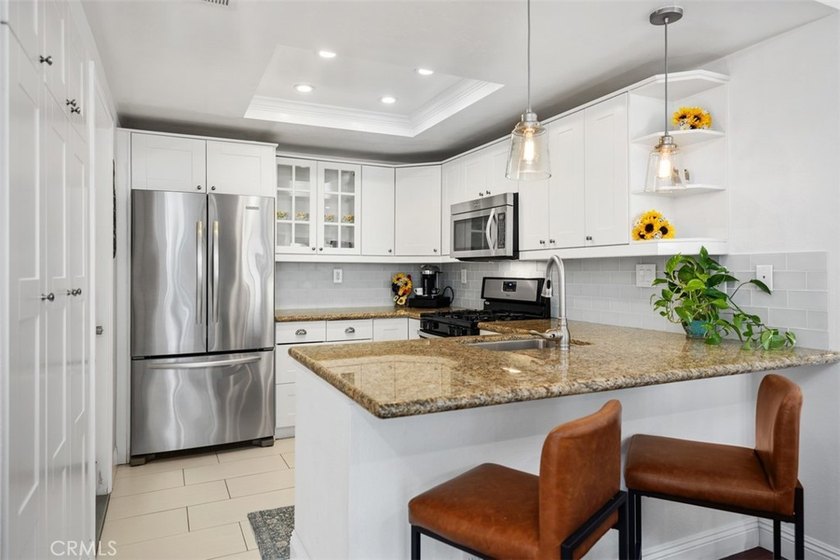 Ideally situated near the scenic Santa Margarita Lake and - Beach Condo for sale in Rancho Santa Margarita, California on Beachhouse.com