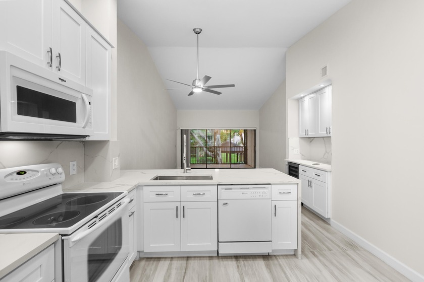 Welcome home to this impeccably remodeled oasis, where modern - Beach Condo for sale in Deerfield Beach, Florida on Beachhouse.com