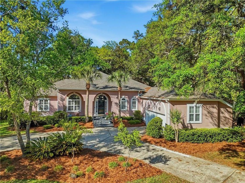 Nestled in the sought-after Hampton Plantation community on - Beach Home for sale in Saint Simons, Georgia on Beachhouse.com
