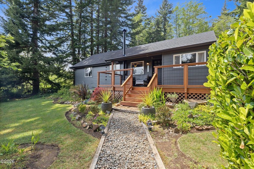 SECLUDED SETTING, YET JUST MINUTES TO TOWN! Sweet and stylish - Beach Home for sale in Otis, Oregon on Beachhouse.com