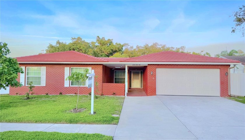 Welcome to this beautifully updated 5-bedroom, 3-bath home - Beach Home for sale in Clearwater, Florida on Beachhouse.com