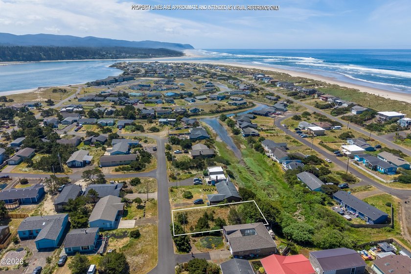 Rare Bayshore opportunity with full canal views and direct water - Beach Lot for sale in Waldport, Oregon on Beachhouse.com