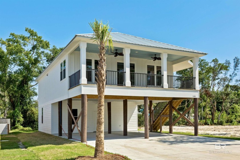 Welcome to this stunning new construction home in Bear Point, a - Beach Home for sale in Orange Beach, Alabama on Beachhouse.com