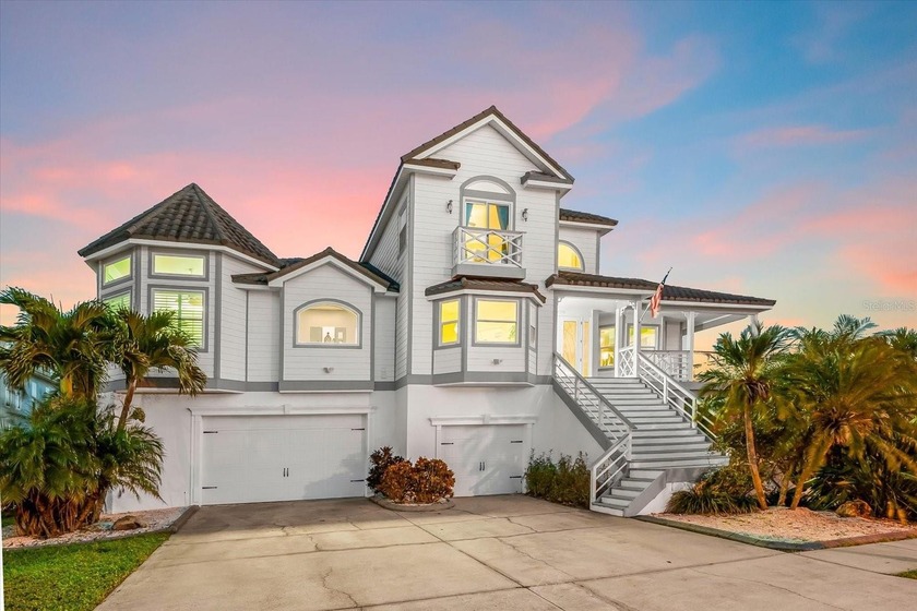 Welcome to a striking coastal residence in the coveted, gated - Beach Home for sale in Tarpon Springs, Florida on Beachhouse.com
