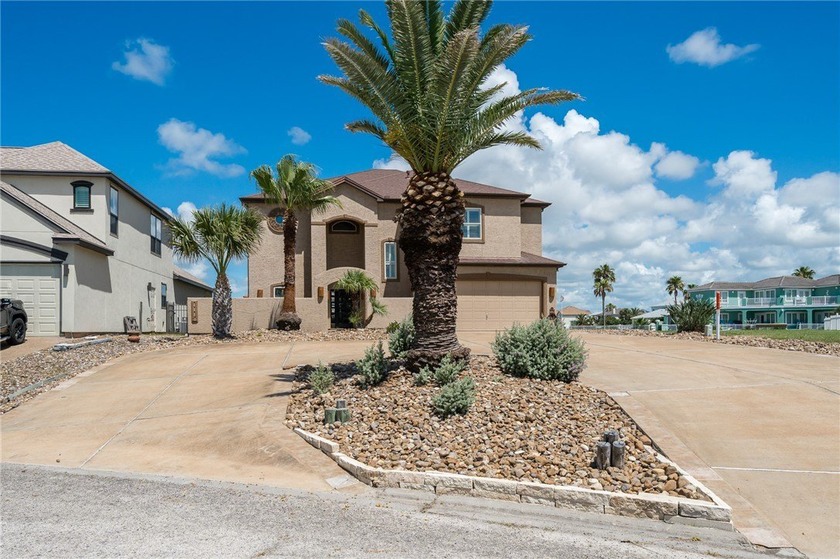 This stunning canal-front home offers 65 feet of waterfront - Beach Home for sale in Aransas Pass, Texas on Beachhouse.com