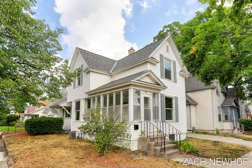 Charming home just steps away from Washington Square! This home - Beach Home for sale in Holland, Michigan on Beachhouse.com