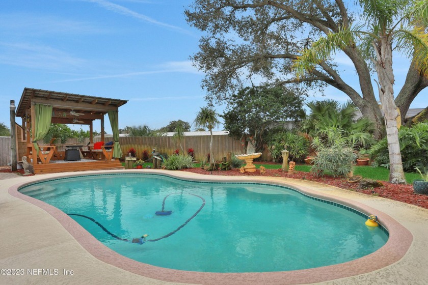 This charming 3 bedroom 2 bath pool home is just 5 blocks from - Beach Home for sale in Jacksonville Beach, Florida on Beachhouse.com