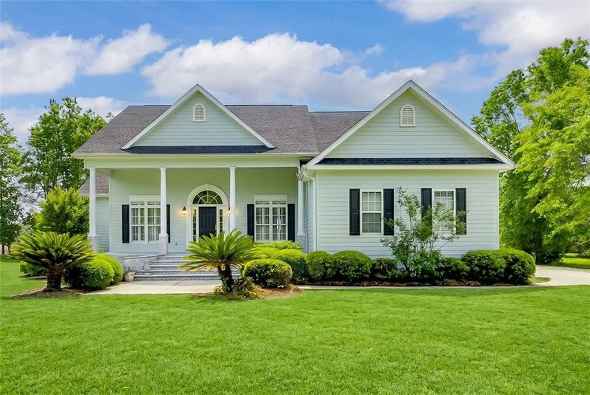 Charming marsh front cottage at 1997 Cooper's Point Drive with - Beach Home for sale in Townsend, Georgia on Beachhouse.com