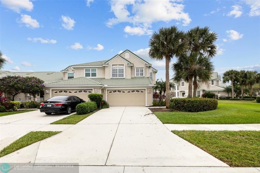 Discover this pristine townhome nestled in the tranquil Lake - Beach Townhome/Townhouse for sale in Port Saint Lucie, Florida on Beachhouse.com