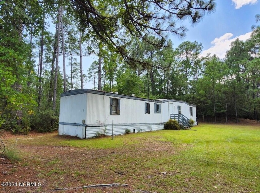 This double lot totaling 0.73 acres in a private and serene - Beach Home for sale in Southport, North Carolina on Beachhouse.com