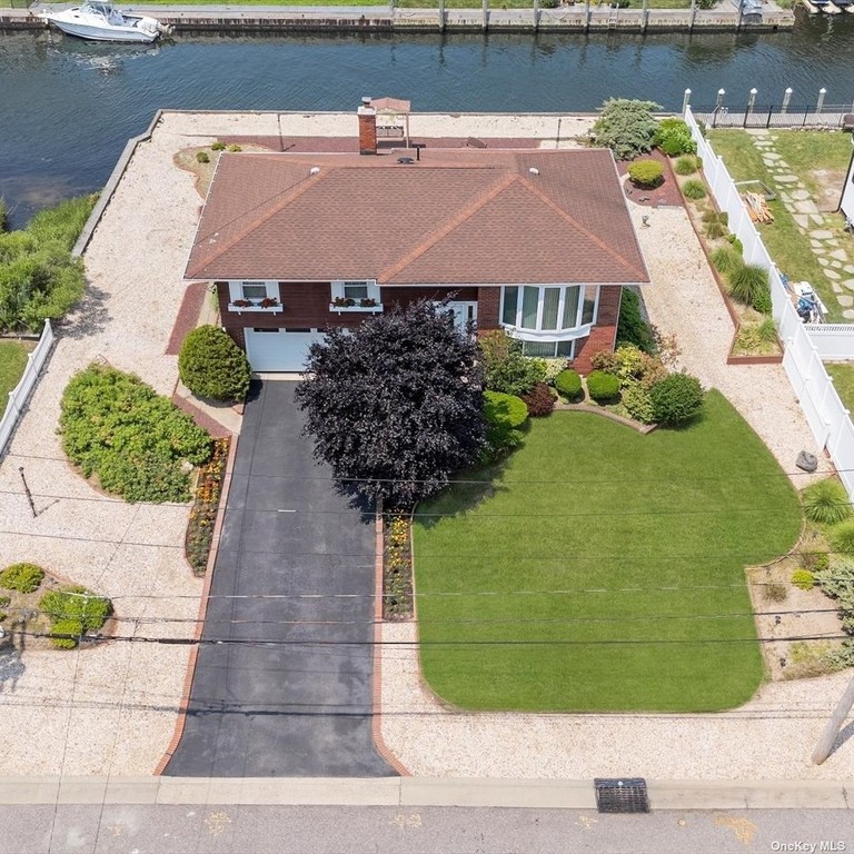 Discover the allure of waterfront living in the prestigious - Beach Home for sale in West Islip, New York on Beachhouse.com