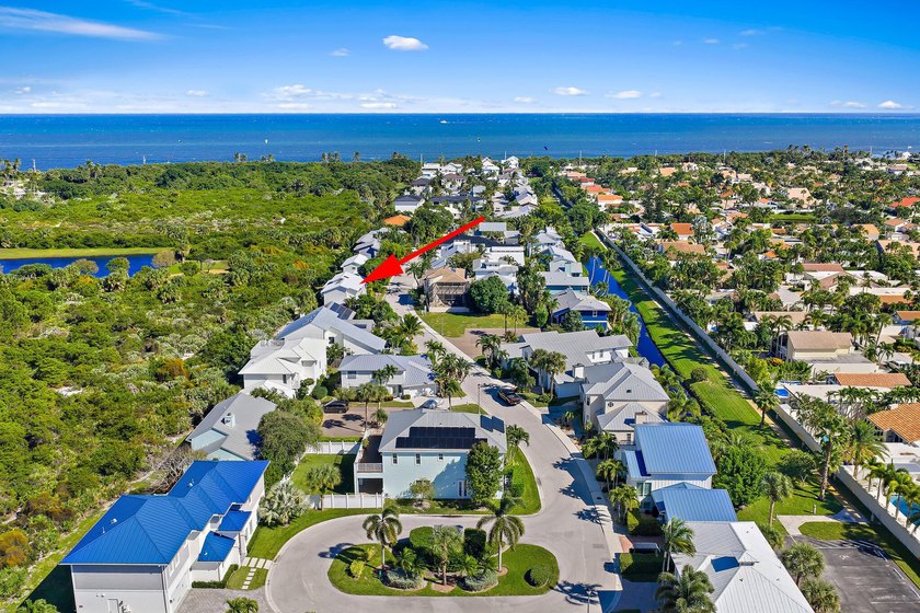 Nestled within the exclusive gated Jupiter Beach community of - Beach Home for sale in Jupiter, Florida on Beachhouse.com