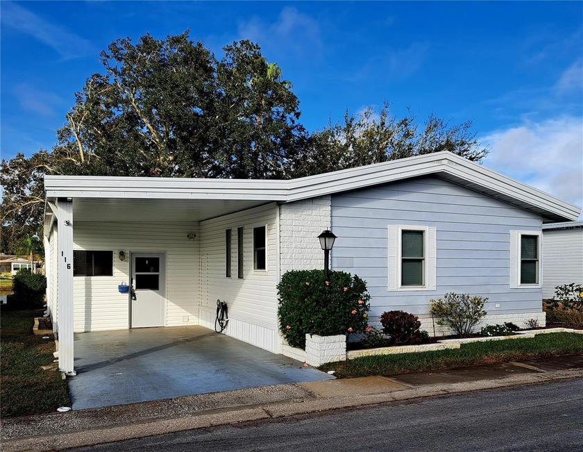 Enjoy waterfront living, generous space, and a vibrant 55+ - Beach Home for sale in Palm Harbor, Florida on Beachhouse.com
