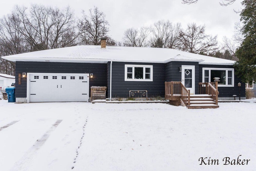 This immaculate Spring Lake home with brand new windows and - Beach Home for sale in Spring Lake, Michigan on Beachhouse.com