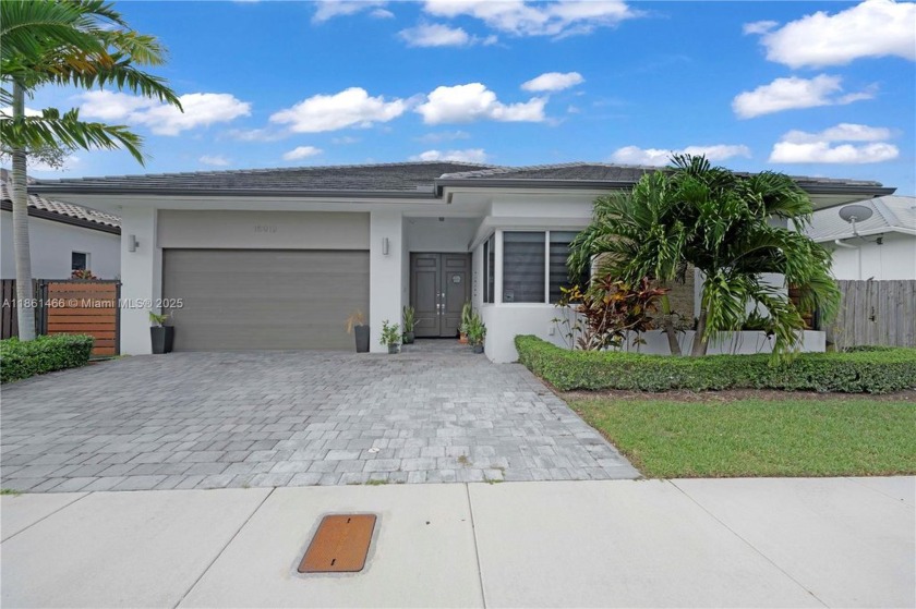 Beautiful coastal home featuring a spacious open floor plan with - Beach Home for sale in Miami, Florida on Beachhouse.com