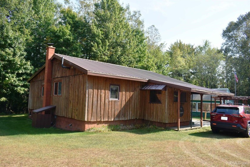 SINGLE FAMILY HOME WITH FULL BASEMENT AND LARGE GARAGE AS WELL - Beach Home for sale in Rapid River, Michigan on Beachhouse.com