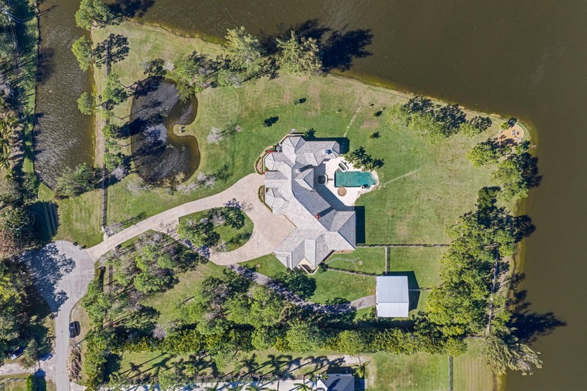 MULTI-USE, PRISTINE 5-ACRE POINT LOT surrounded by water - Beach Home for sale in Lake Worth, Florida on Beachhouse.com