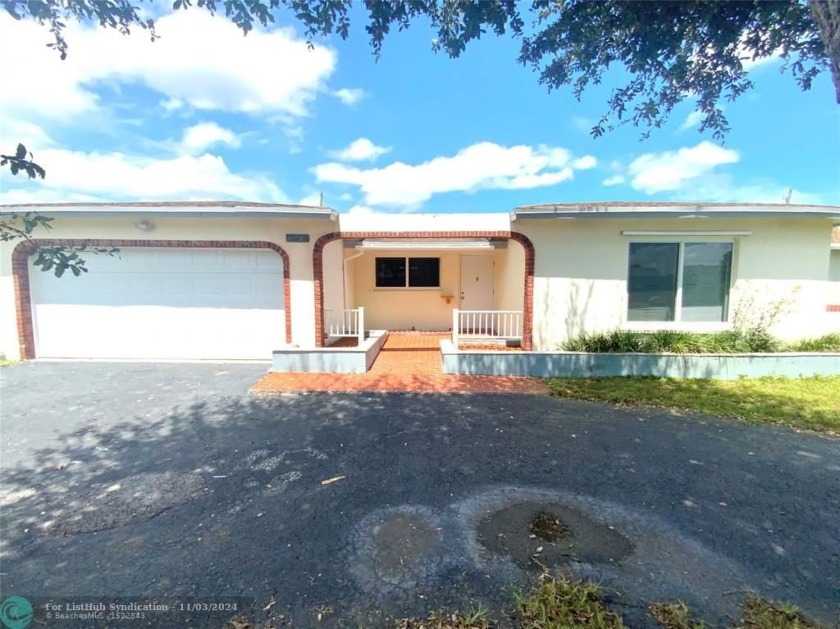 This beautifully updated 4 bed, 2 bath home, boasting over 1,700 - Beach Home for sale in Sunrise, Florida on Beachhouse.com