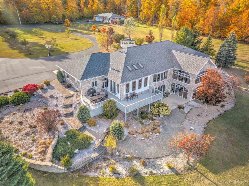 Discover the epitome of luxury living in this breathtaking - Beach Home for sale in Manistique, Michigan on Beachhouse.com