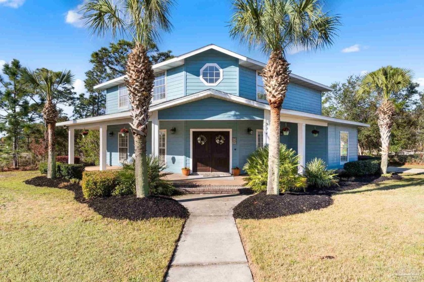 ASSUMABLE LOAN! Situated on a desirable corner lot, this - Beach Home for sale in Pensacola, Florida on Beachhouse.com