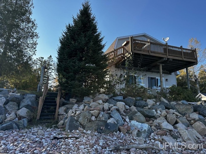 Clean and pristine, this wonderful 4 BR, 2 BA home enjoys - Beach Home for sale in Baraga, Michigan on Beachhouse.com