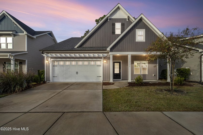 Welcome to this stunning two-story home featuring a modern open - Beach Home for sale in Wilmington, North Carolina on Beachhouse.com