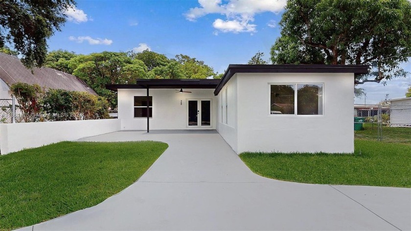 Welcome to this stunningly remodeled 4-Bedroom, 2-Bathroom - Beach Home for sale in Miami, Florida on Beachhouse.com