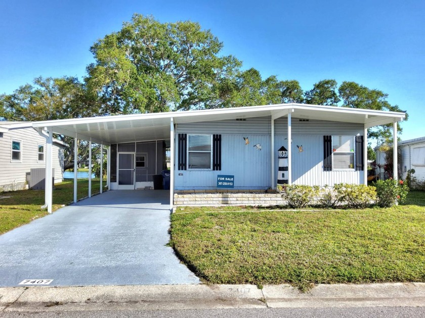 Introducing a charming two-bedroom, two-bathroom home nestled - Beach Home for sale in Ellenton, Florida on Beachhouse.com
