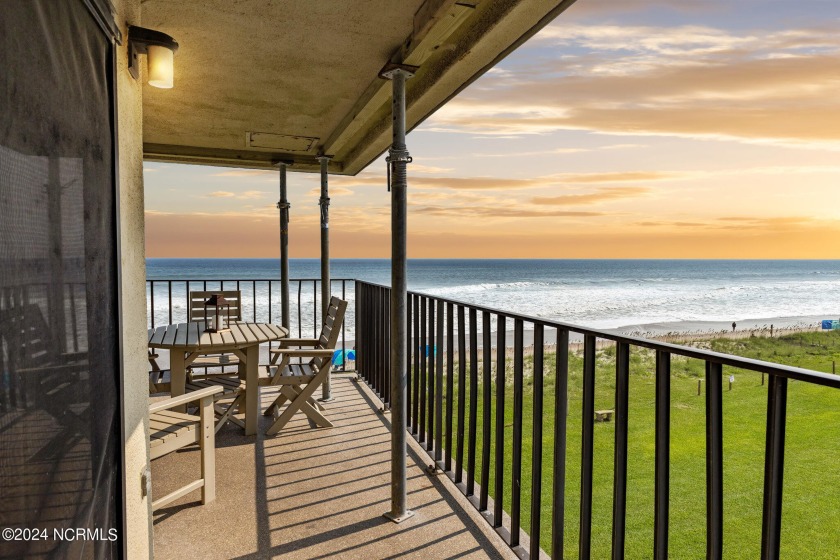 Imagine having dinner or a quiet breakfast on your ocean front - Beach Condo for sale in Indian Beach, North Carolina on Beachhouse.com