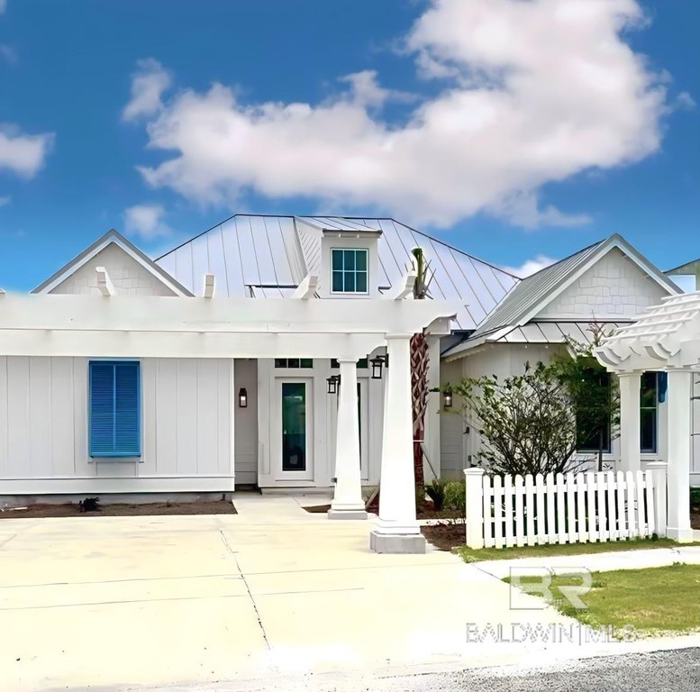 Nestled discreetly within the exclusive confines of The Beach - Beach Home for sale in Gulf Shores, Alabama on Beachhouse.com