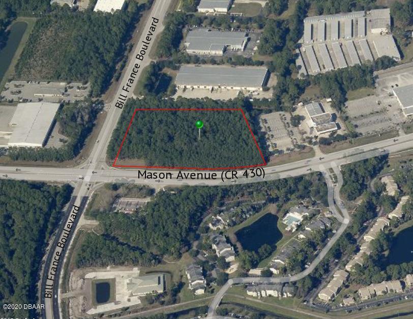 5.57 acres on the signalized highly visible NE corner of Bill - Beach Commercial for sale in Daytona Beach, Florida on Beachhouse.com