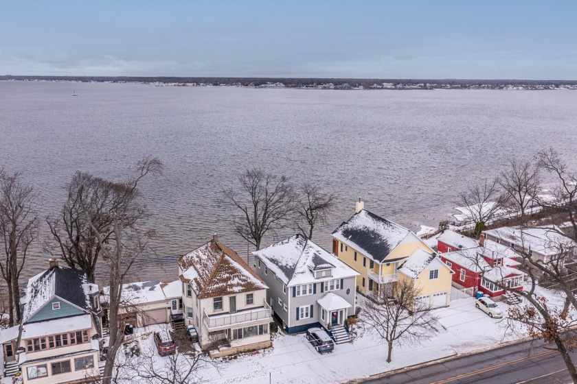 Incredible Muskegon Lake Views & Prime Location. This charming - Beach Home for sale in Muskegon, Michigan on Beachhouse.com