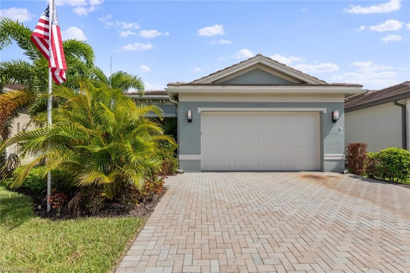 This immaculate 3 bed+2 bath, attached 2-car garage open floor - Beach Home for sale in Bonita Springs, Florida on Beachhouse.com