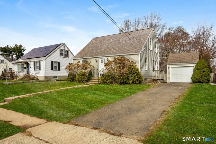 Introducing 185 Meadowside Rd...an attractive Cape stye home - Beach Home for sale in Milford, Connecticut on Beachhouse.com